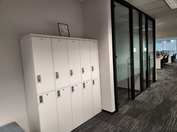 a room with white lockers