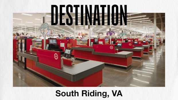 A video still with South Riding, Va., Store Director Joe R. walking down an aisle.