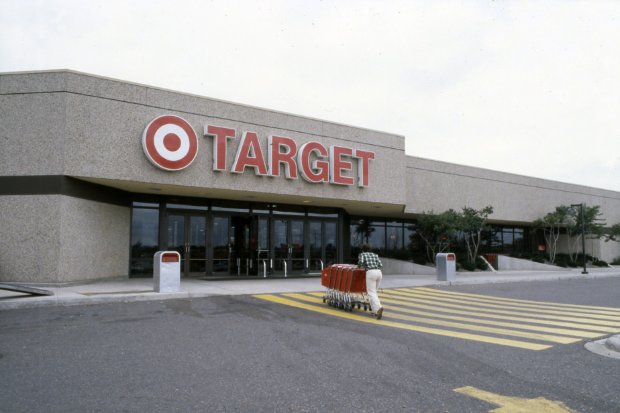 a person pushing a cart with SugarHouse Casino in the background