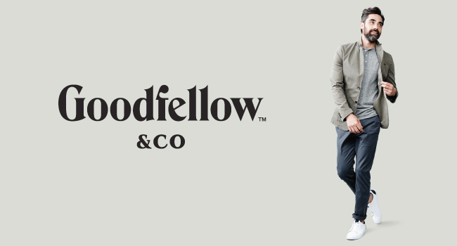 The Goodfellow & Co logo appears next to a man wearing a neutral jacket, t-shirt and pants.