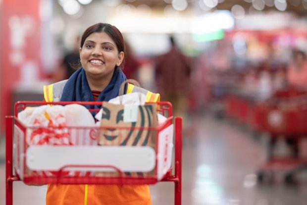 a person carrying shopping bags