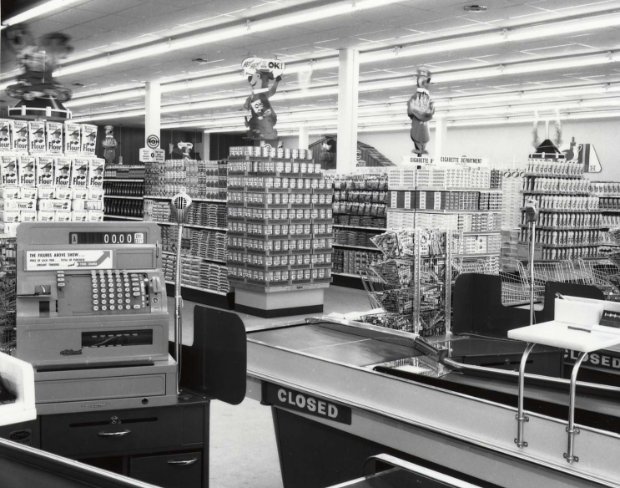 a room with shelves of electronic equipment