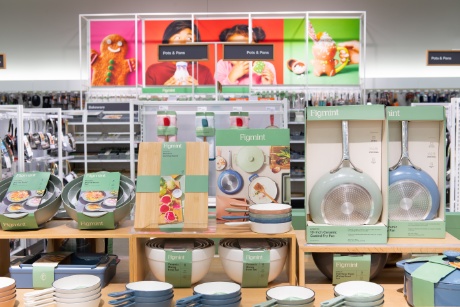A mint green and baby blue display of Target's new kitchenware.