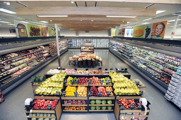 a grocery store with fruits and vegetables