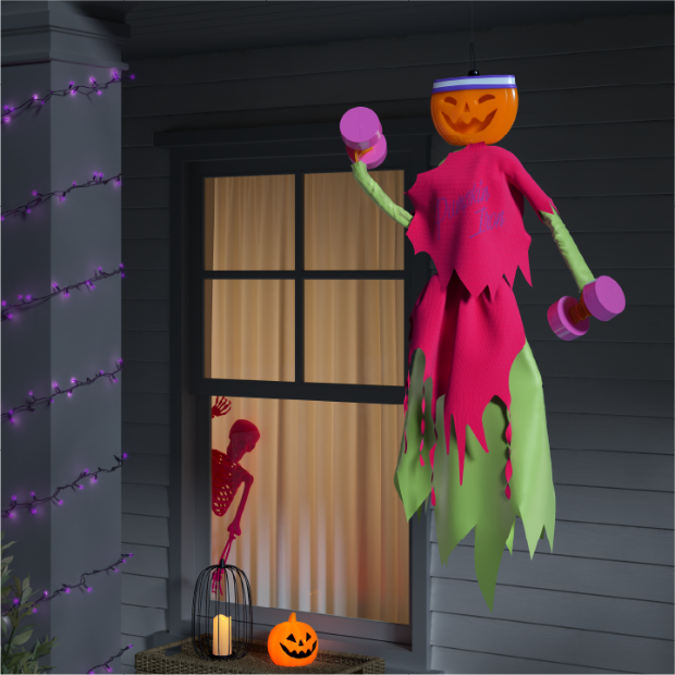 The Pumpkin Iron Lewcy ghoul holding purple dumbbells, hanging from a branch in front of a house.