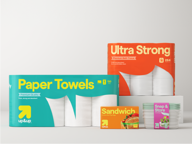 Packages of up&up paper towels, bath tissue, sandwich bags and food storage containers.