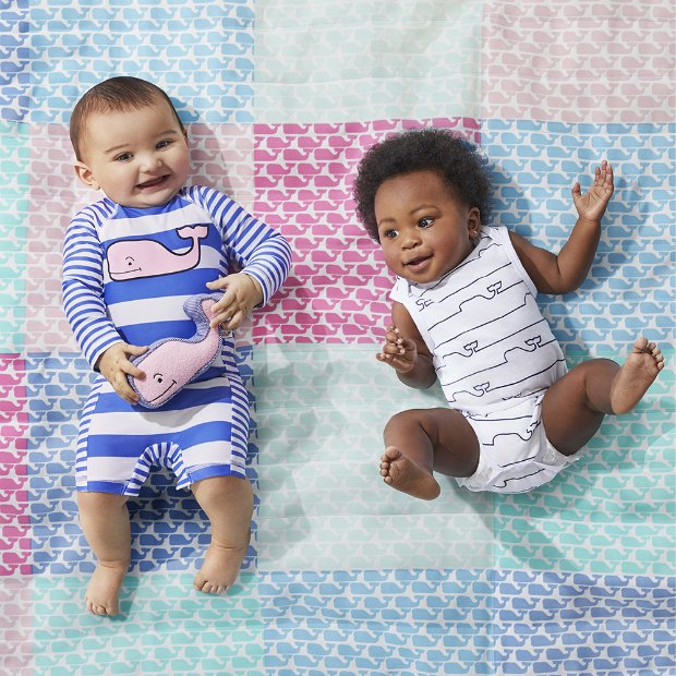 a couple of babies posing for the camera