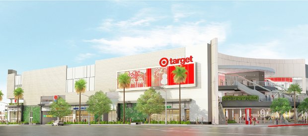 a large building with palm trees in front of it