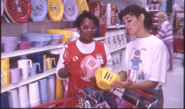 a couple of women in a grocery store