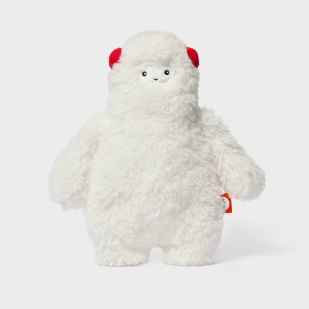 White Yeti Plush with red ear and red tag accent