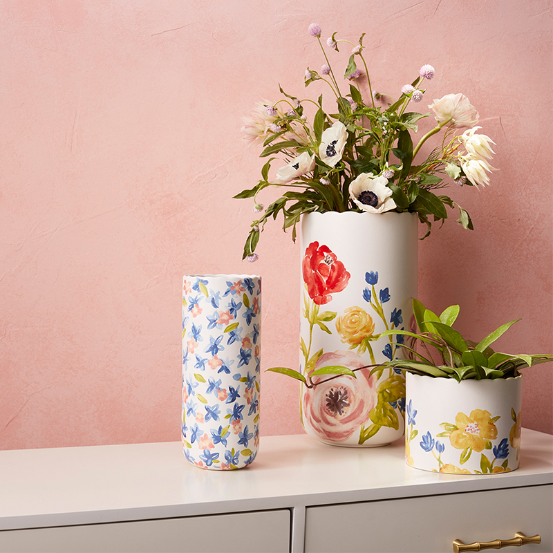 Three vases painted with floral patterns