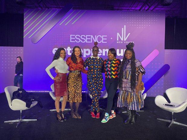 a group of women posing for a photo