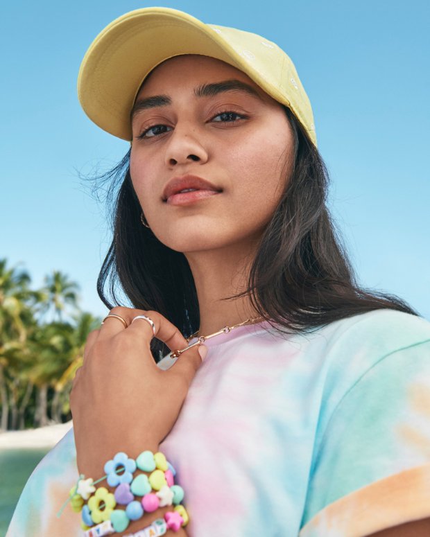 a woman wearing a yellow hat