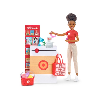 A white background displays a woman (Danielle) in a red Target uniform available at a Target cash register with shopping bags, gift cards and a cart.