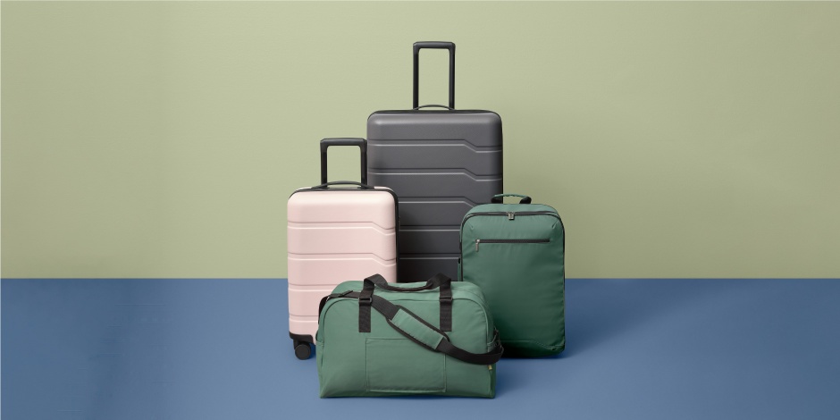 a group of luggage sits on a blue table