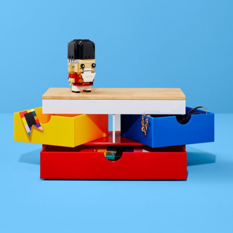 a toy figure on a desk