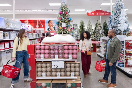 Target guests are shopping in a section full of holiday decor.