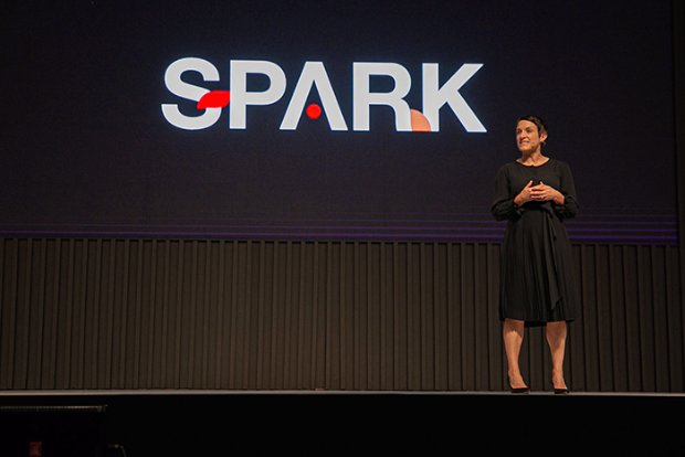 a woman standing on a stage