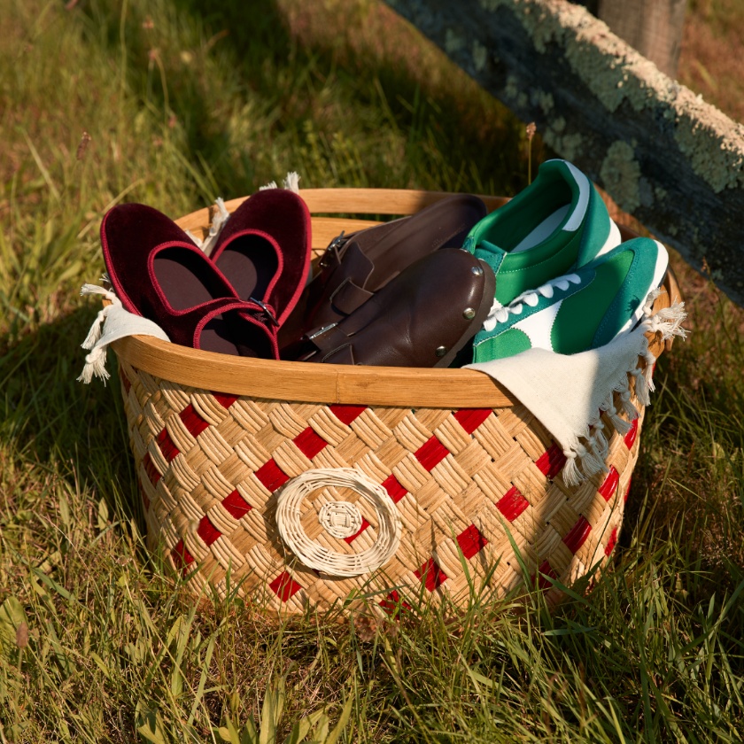 A woven Target basket filled with shoes.