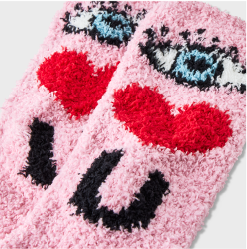 Pink fuzzy Valentine’s socks.