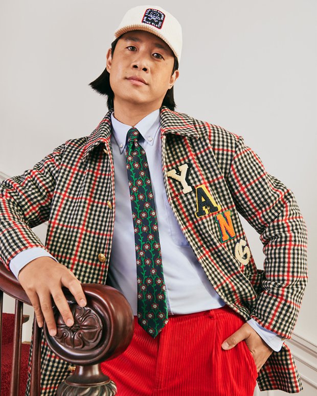 A model poses, wearing Rowing Blazers x Target collection.