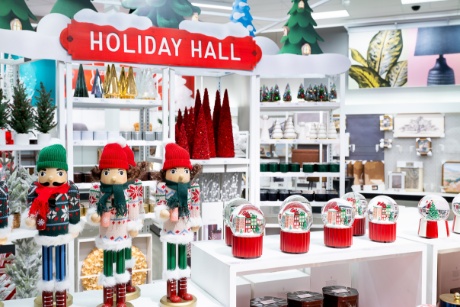 Items including snow globes are displayed in Holiday Hall.