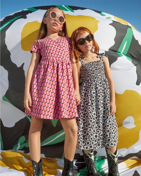 Two child models pose, wearing Diane von Furstenberg for Target collection.