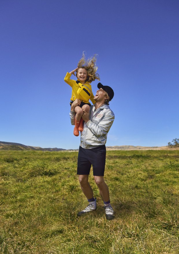 a man holding a baby