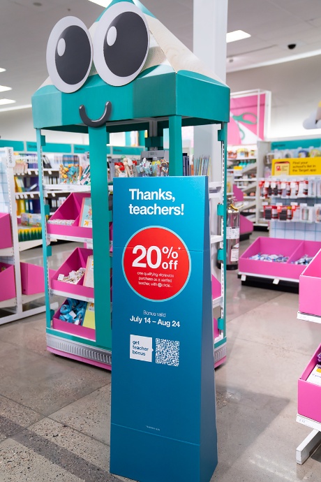 A bright Target sign promotes the 20% student discount on Back-to-School essentials.