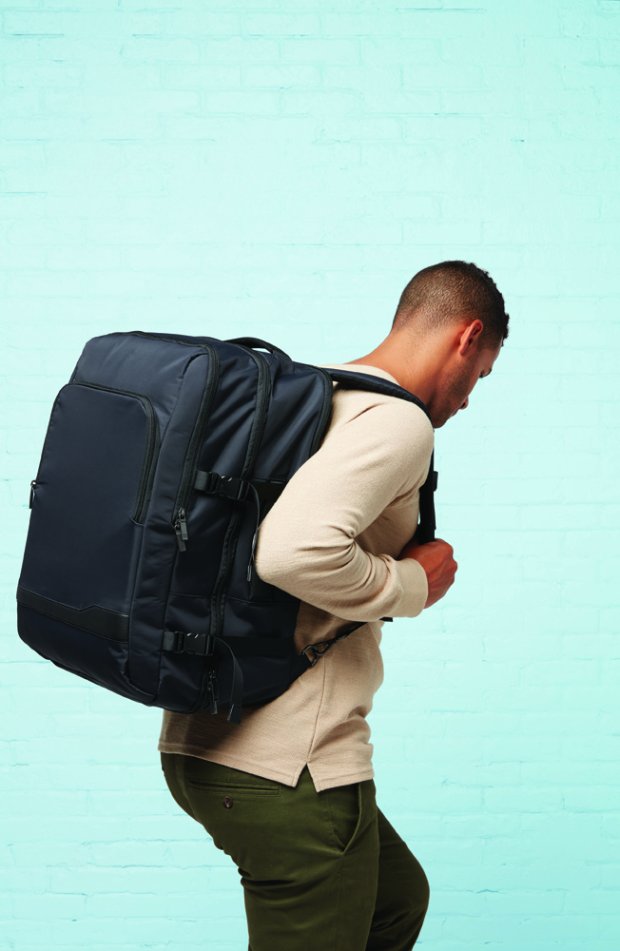 a man carrying a backpack