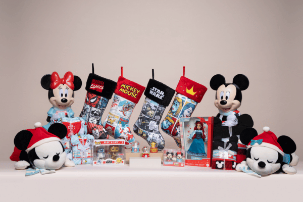 A group layout of Disney-themed Christmas gifts including stockings, pillows and more.