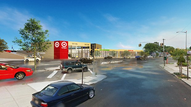 a parking lot with cars and a building in the background