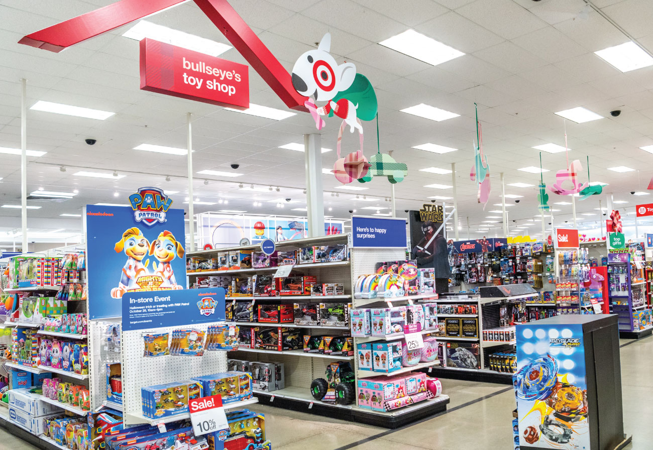 Bullseye's Toy Shop signage hangs above Target toy aisles