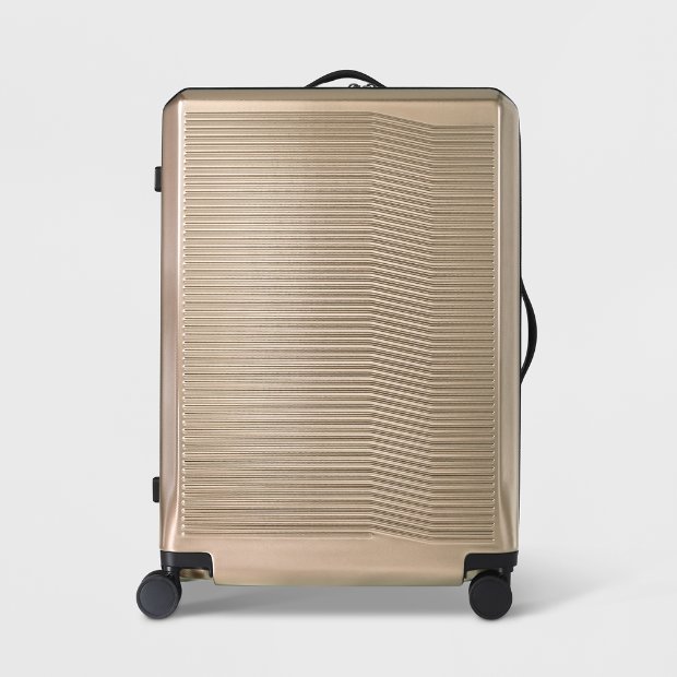 a brown suitcase with wheels