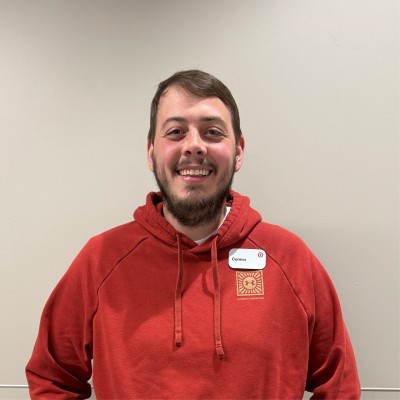 a man wearing a red shirt