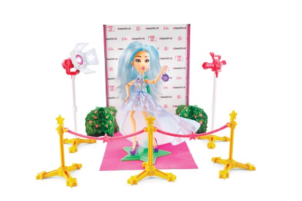 a child's drawing of a girl with a camera and a plant