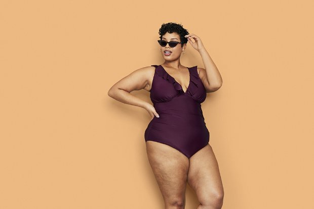 a woman wearing a purple dress