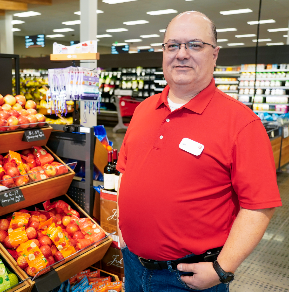 Target store director Joe R. stands in the grocery section of a store.