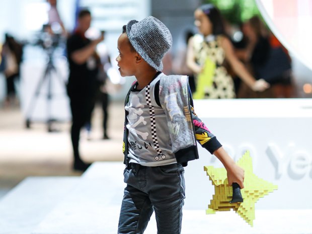 a person holding a yellow object