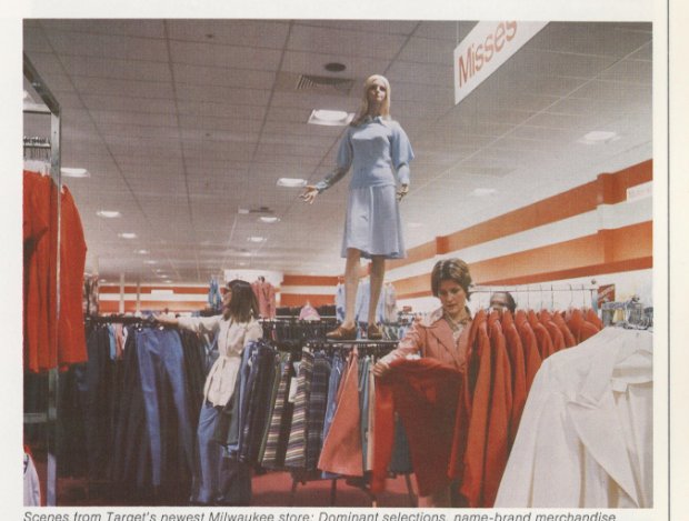 a person standing on a personnequin in a store