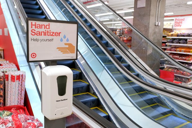 a sign on a glass shelf