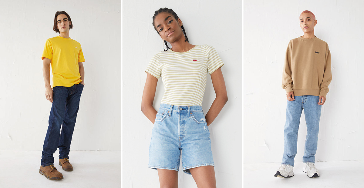 : A model in a yellow Levi’s relaxed fits SS logo tee and 505 regular jeans; another model in a Levi’s honey short sleeve tee and 501 mid-thigh jean shorts; and a model in a Levi’s seasonal crew and 501 original jeans.