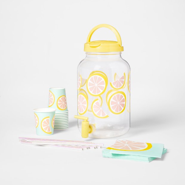 a bottle of oil and a few small cups